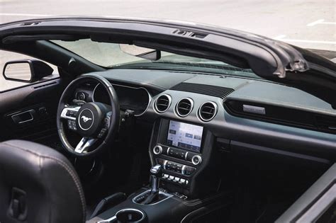 Rent Ford Mustang Black in Dubai - Convertible - Octane.Rent