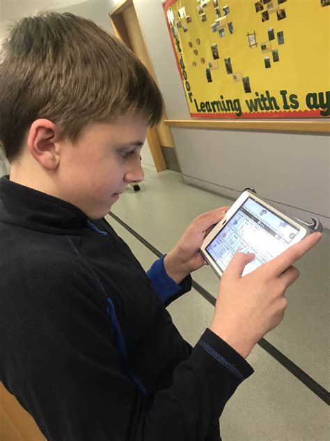 Image result for Child Using Proloquo2Go