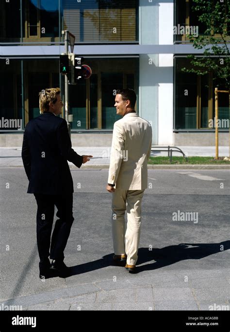 Man in a Business Suit in a Mall Parking Lot 的图像结果