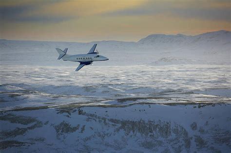 Image result for Plane Flying Over Snow