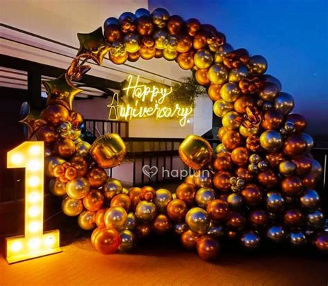 Anniversary Love Decor With Balloons And Rose Petals