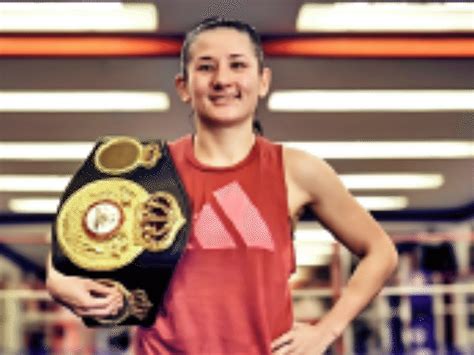 Nina Hughes of Britain became world champion of boxing at the age of 41