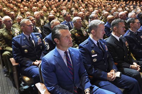In speech to generals, Hegseth calls for ‘woke’ to ‘warrior’ military ...