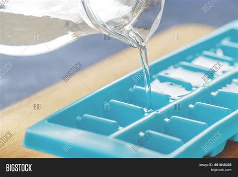 Pouring Water Into Ice Image & Photo (Free Trial) | Bigstock