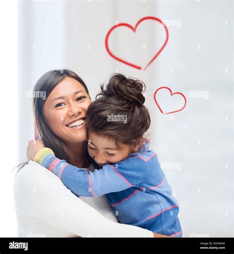 Hugging Mother And Daughter