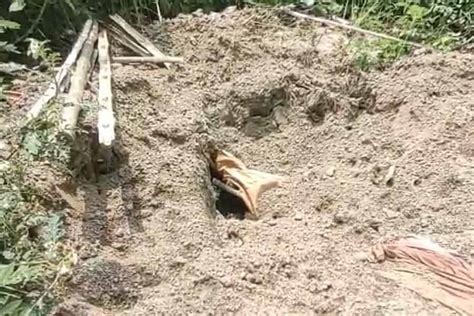Multiple holes in the cemetery in Nabadwip