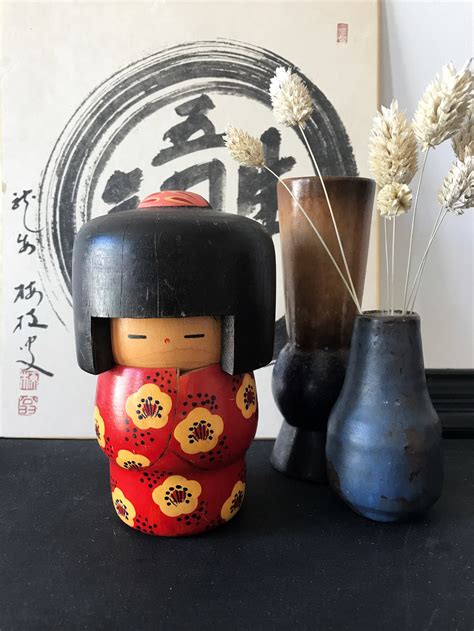 » Vintage wobble-head Kokeshi doll