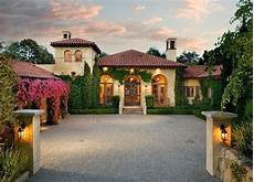 Wooden Windows Style Mediterranean by Mediterranean Exterior Of Home With Arched Window Transom Wooden Windows Style Mediterranean