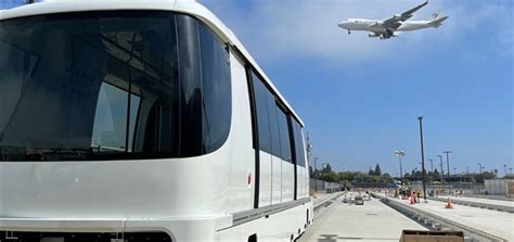 LAX unveils new automated people mover's first train cars | Urbanize LA