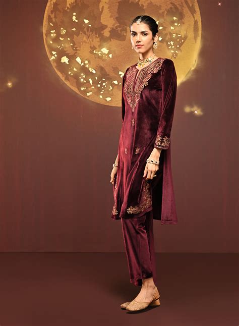 Shine with Lakshita’s Maroon Embroidered Velvet Kurta Set