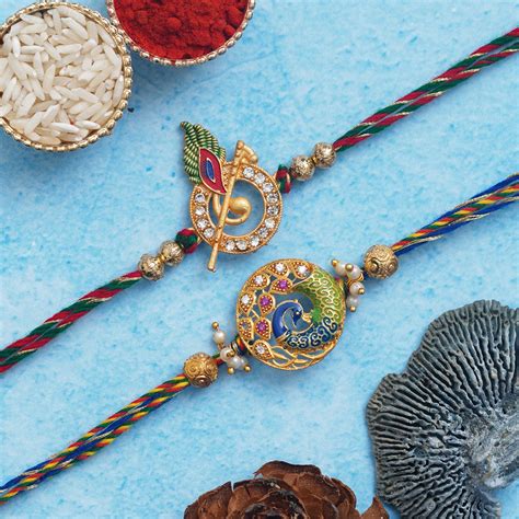 Set of 2 Beautiful Peacock, Peacock Feather with Flute Designer Rakhis ...