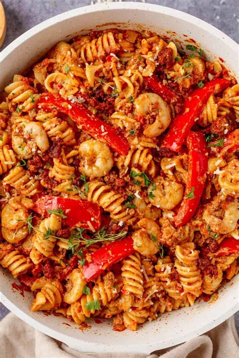 THE BEST Creamy Cajun Shrimp Pasta With Sausage - The Yummy Bowl