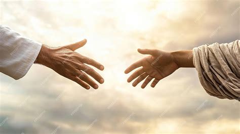 Jesus christ reaching out his hand to help person or children of god in ...