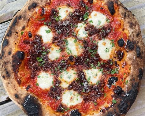 Pizza Mondays — Lucky Horseshoe Lounge