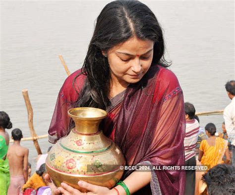 Devotees celebrate Chhath Puja at Ganga ghat in Patna on Monday ...