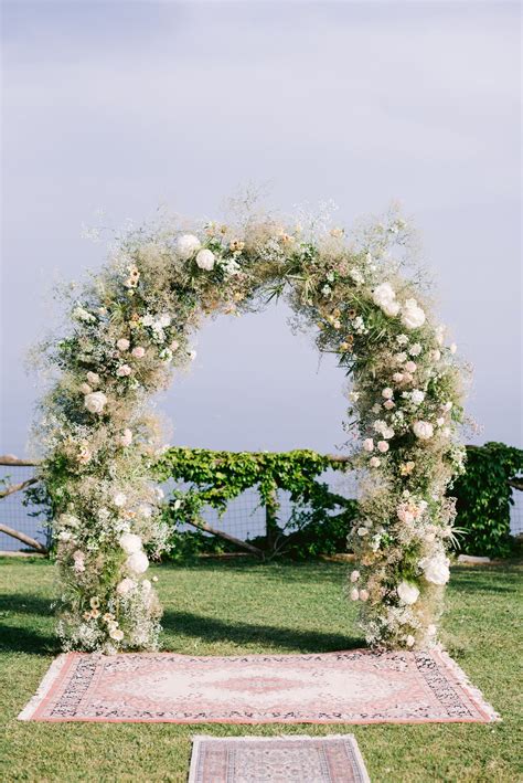 Texturized flower arch | Wedding arch flowers, Wedding arch, Floral ...
