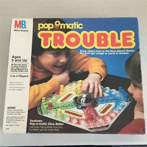 Pop-O-Matic Trouble board games (1980s) - Fonts In Use