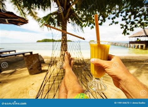 Man Drinks Mango Juice on the Beach Stock Photo - Image of paradise ...