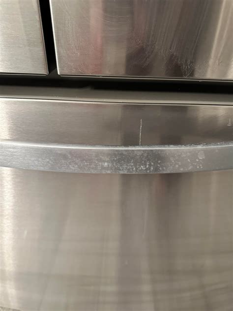Lysol Kitchen spray left a white residue on Whirlpool fridge handles ...