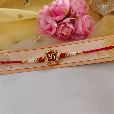 RAKHI - Swastik Kundan Charm Set of 1 (RK006) – Kalakariatoz