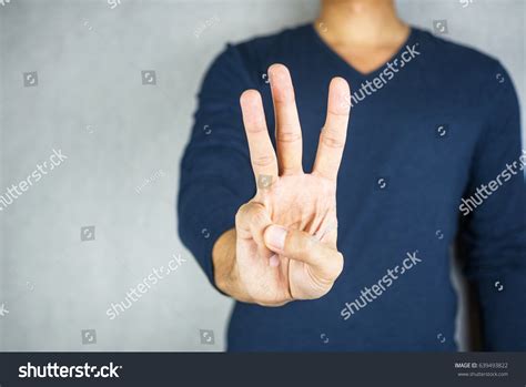 Three Finger Salute Hand Gesture On Stock Photo (Edit Now) 639493822
