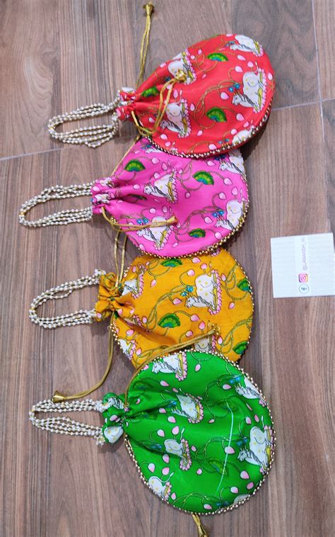 LAMANSH Pichwai Cow Printed Potli bags for Pooja Ceremony Giveaways ...