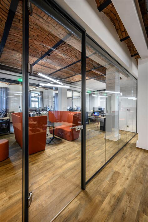 Modern glass partition with a historic vaulted ceiling | Partitions and ...