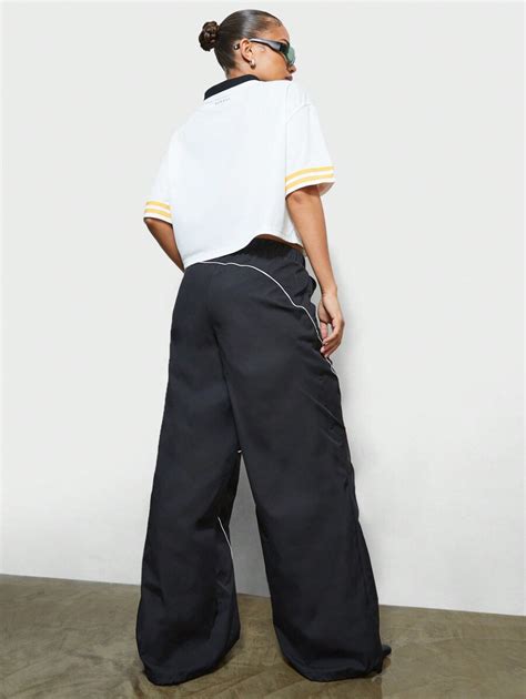 SUMWON WOMEN Calça Jogger Nylon Soltinha e Folgada com Aplique de Letra ...