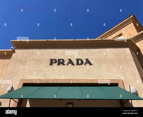 Prada sign, logo on the store facade at Desert Hills Premium Outlets ...