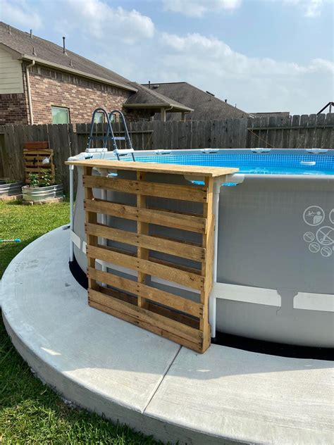 Above Ground Swimming Pool in Backyard