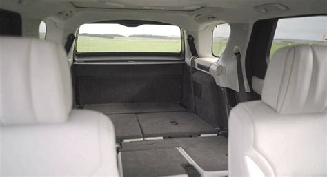 Land Rover tests world first intelligent seat folding tech ...