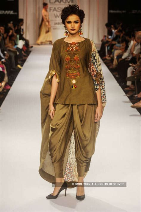 A model walks the ramp for designer Divya Sheth during the Lakme ...