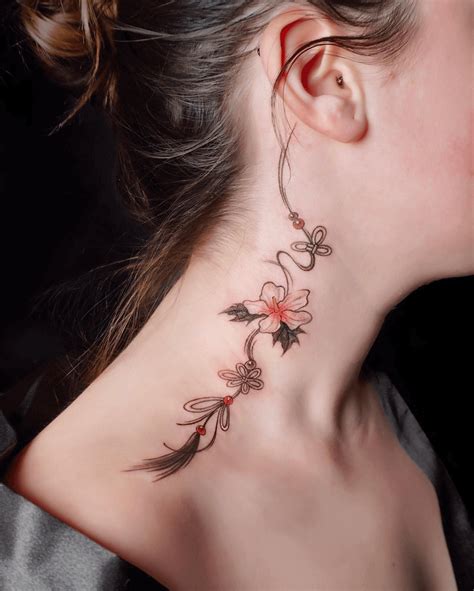 15 Throat Tattoos For Women That Make A Bold Statement