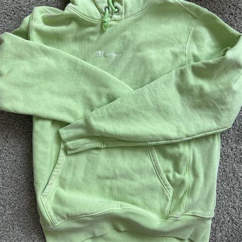 Light green champion hoodie light grey marks by pocket - Depop