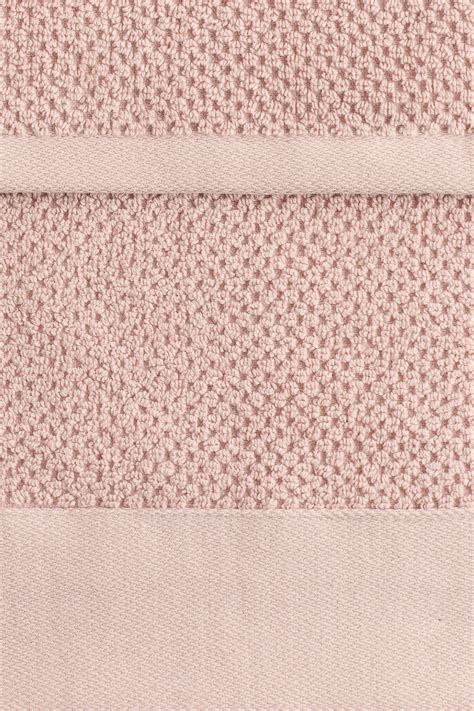 Powder pink 2-pack cotton terry guest towels at H&M Home | H&M IN
