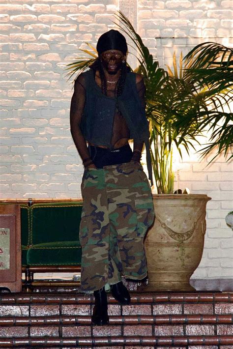 Only Playboi Carti Could Wear a Mesh Bodysuit & Cargo Shorts