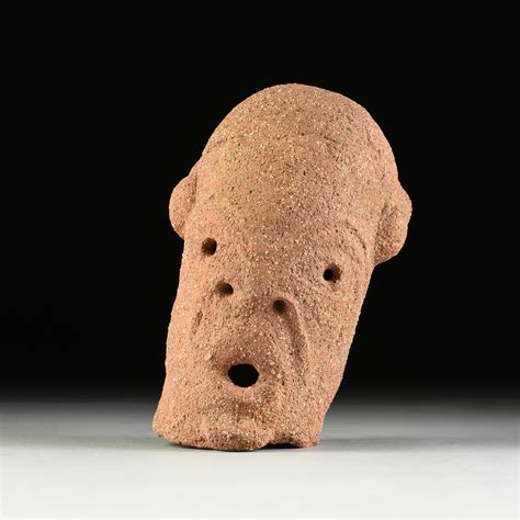 Lot - AN ANCIENT AFRICAN IRON AGE TERRACOTTA LARGE HEAD OF MAN, NOK ...