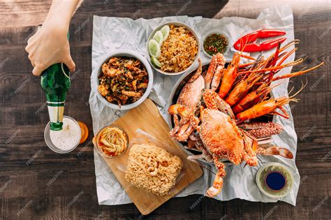 Top view of steamed giant mud crabs, grilled prawns (shrimps), crab ...