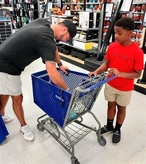 AJ McCarron sponsors shopping spree at Academy Sports + Outdoors - al.com