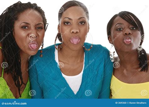 Sticking out tongues stock photo. Image of sisters, ethnic - 369360