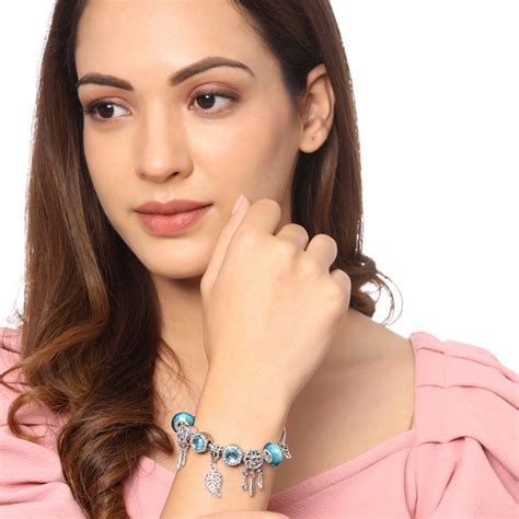 Buy Yellow Chimes Eye-catching Silver Tone With Different Charms ...