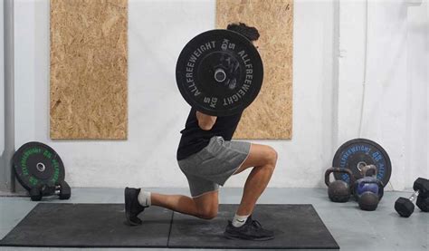 Dumbbell Split Squat: How-to, Tips, Variations & More