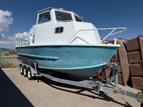 1987 WWG 24Ft Boat with Trailer | AllSurplus