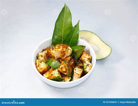 A Bowl of Raw Green Mangoes with Pepper and Salt and Five Spices. Stock ...