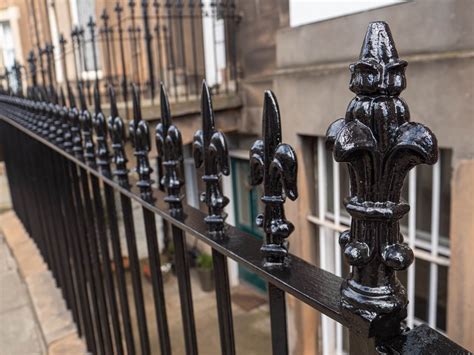 Services -railing restoration & exterior painting - Painted Black