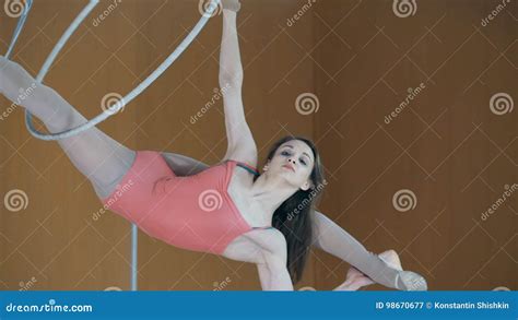 Girl Acrobat, Gymnastics, A Young Athlete In A Blue And White Suit ...