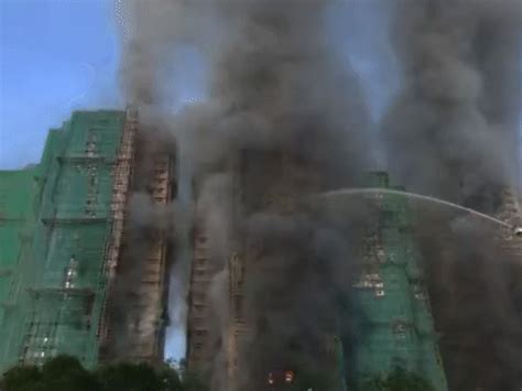 Massive fire in 8 multistorey buildings kills 13 civilians; 15 reported ...