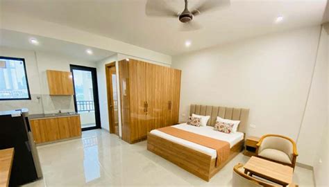 Shared furnished room in a studio | Golf Course Ext... – Roomies.co.in