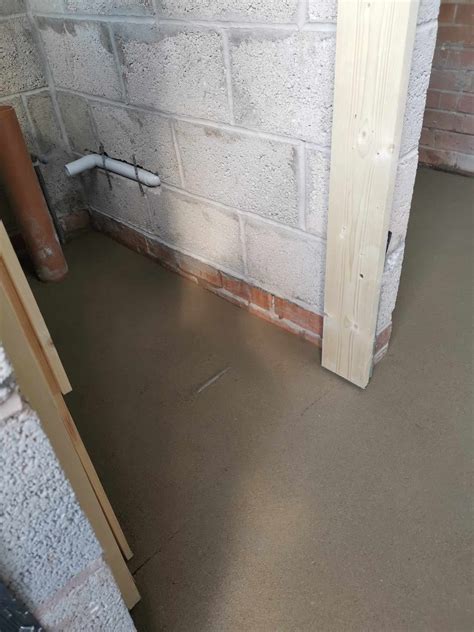 Pipe peeking through newly laid screed floors... what are my options ...