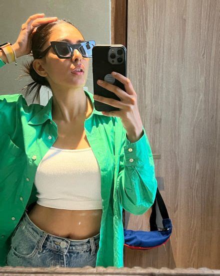 Mrunal Thakur’s signature airport look has the viral bottle green shade ...